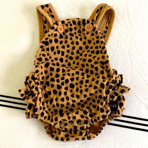 Huxbaby animal print onesie.